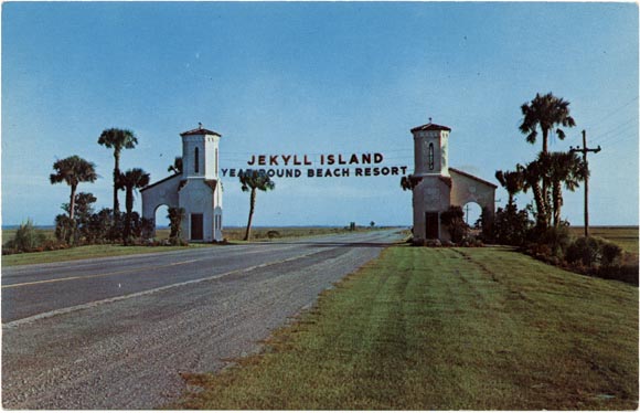 Jekyll highway gate with banner, &ldquot;Jekyll Island Year Round Beach Resort&rdquot;
